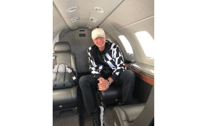 Dave on a jet heading to speaking engagements